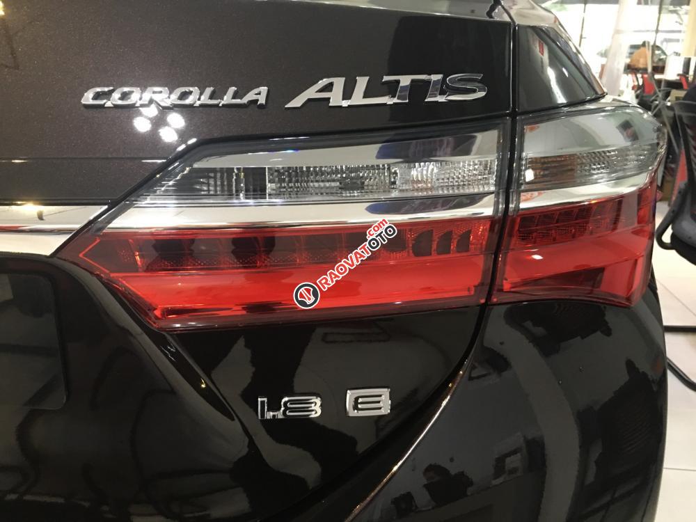 Bán xe Toyota Corolla Altis 1.8E (CVT) màu nâu, giá cạnh tranh, hỗ trợ vay vốn 90%. LH: 0916 11 23 44-7