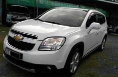 Bán Chevrolet Orlando 1.8LTZ đời 2015, màu trắng, xe gia đình, giá chỉ 595 triệu-0