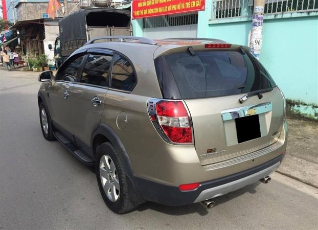 Bán lại xe Chevrolet Captiva LT năm 2009, màu vàng-9