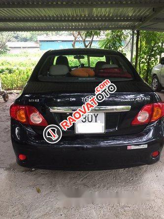 Cần bán xe Toyota Corolla altis đời 2010, màu đen số sàn, 500tr-1