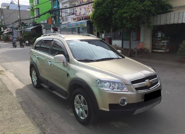 Bán lại xe Chevrolet Captiva LT năm 2009, màu vàng-8