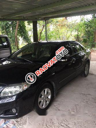 Cần bán xe Toyota Corolla altis đời 2010, màu đen số sàn, 500tr-2