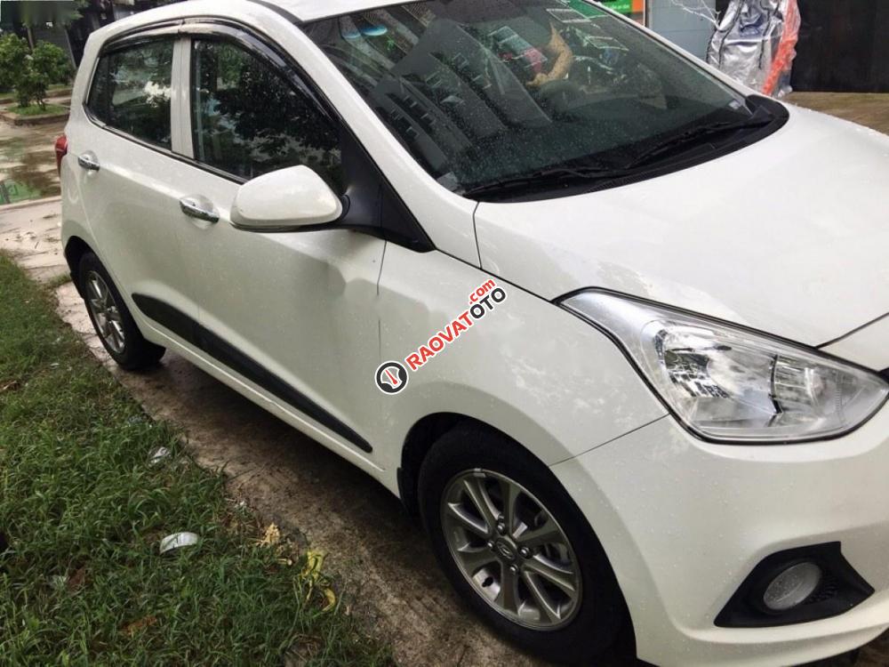 Cần bán Hyundai Grand i10 1.0AT đời 2015, màu trắng, nhập khẩu còn mới-1