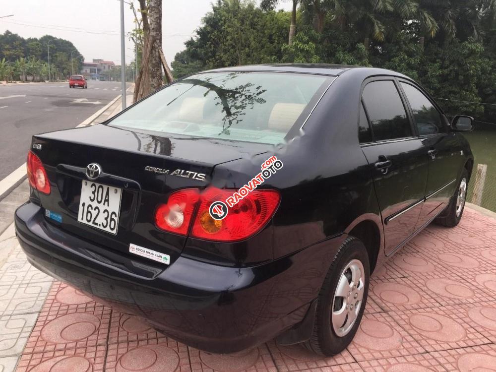 Bán Toyota Corolla altis 1.8G MT đời 2002, màu đen xe gia đình, giá tốt-3