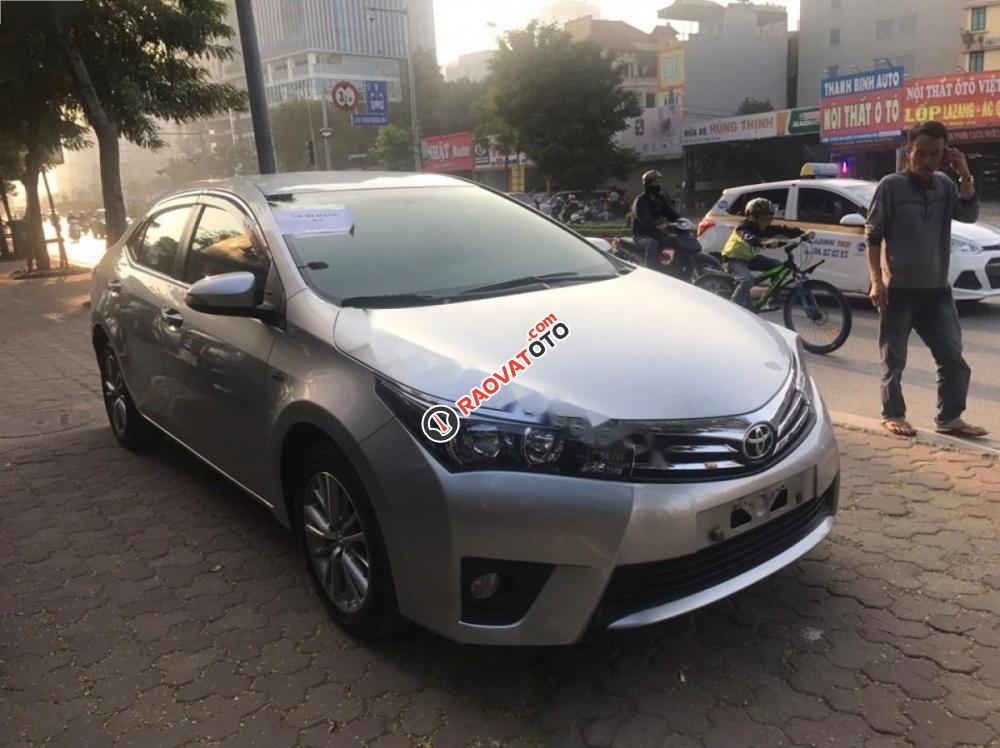 Bán xe Toyota Corolla Altis 1.8G AT đời 2014, màu bạc đẹp như mới-3