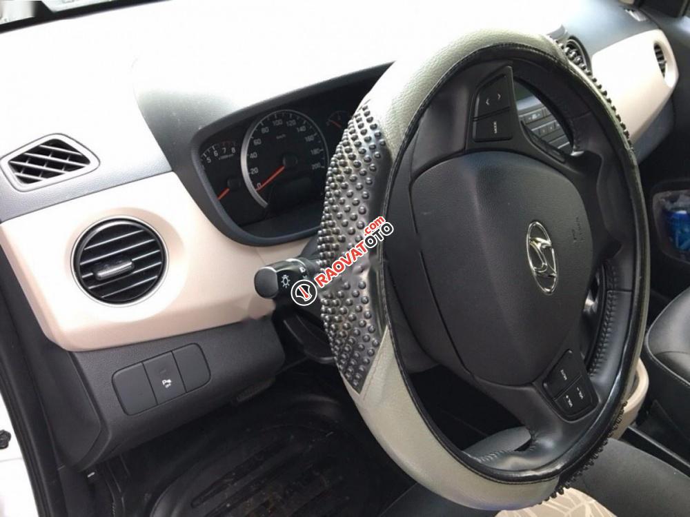 Cần bán Hyundai Grand i10 1.0AT đời 2015, màu trắng, nhập khẩu còn mới-0