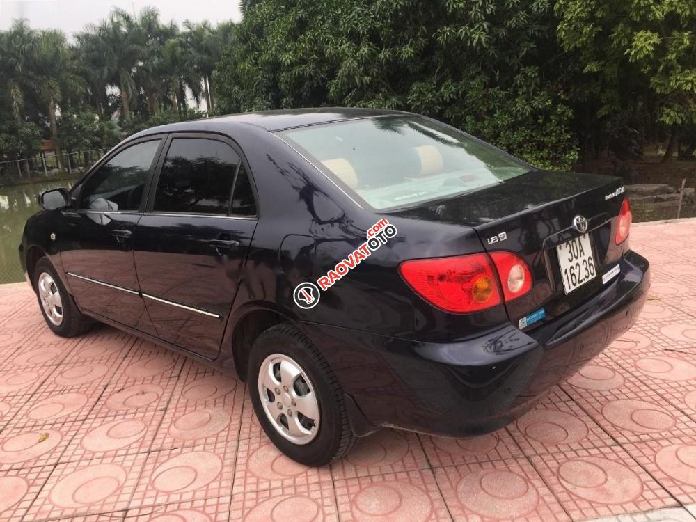 Bán Toyota Corolla altis 1.8G MT đời 2002, màu đen xe gia đình, giá tốt-1