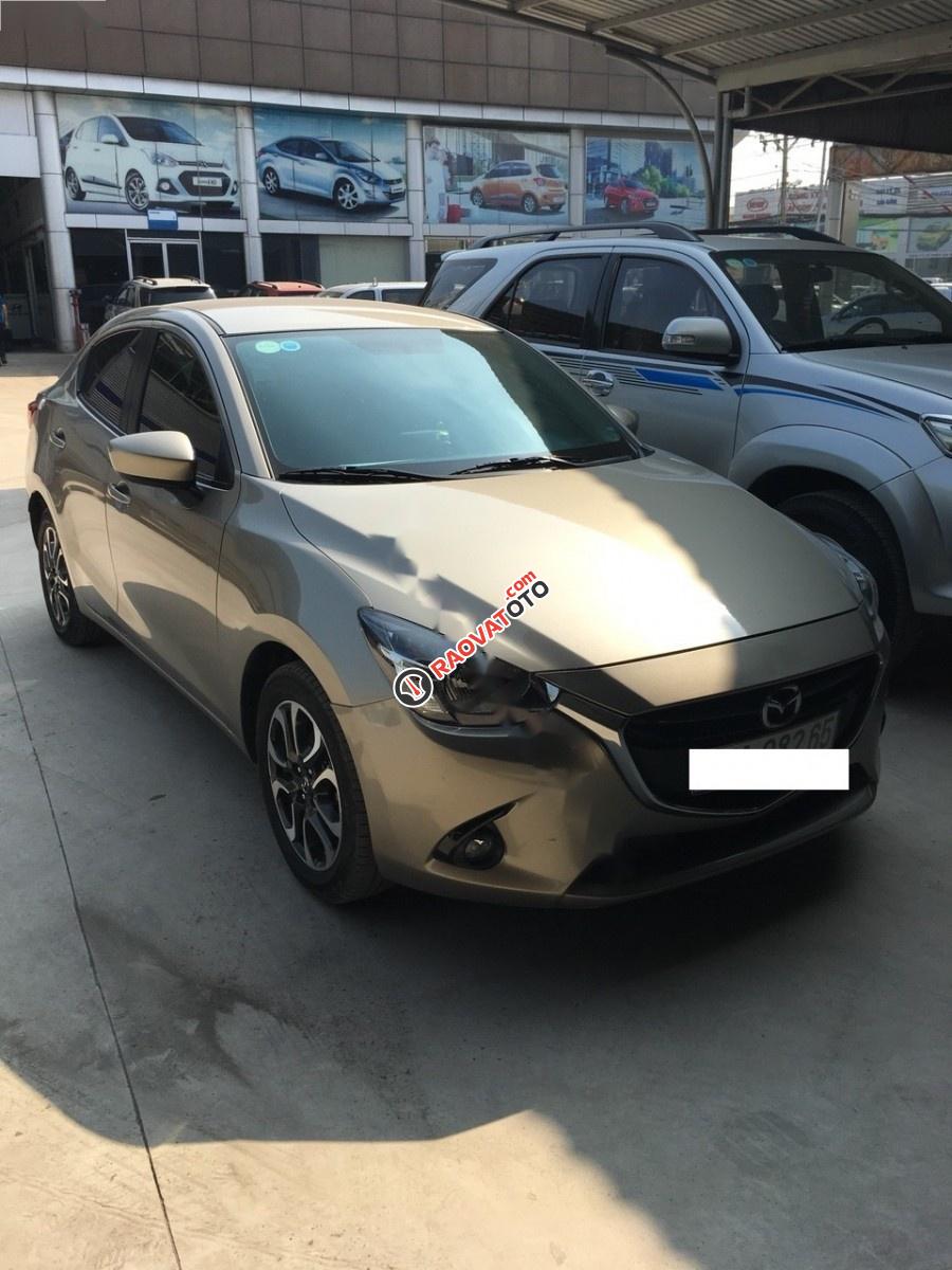 Cần bán lại xe Mazda 2 1.5 AT 2016, màu vàng  -0