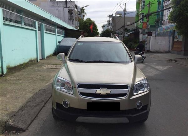 Bán lại xe Chevrolet Captiva LT năm 2009, màu vàng-0