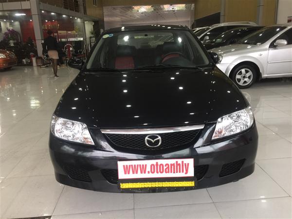 Cần bán gấp Mazda 323 đời 2001, màu đen-0