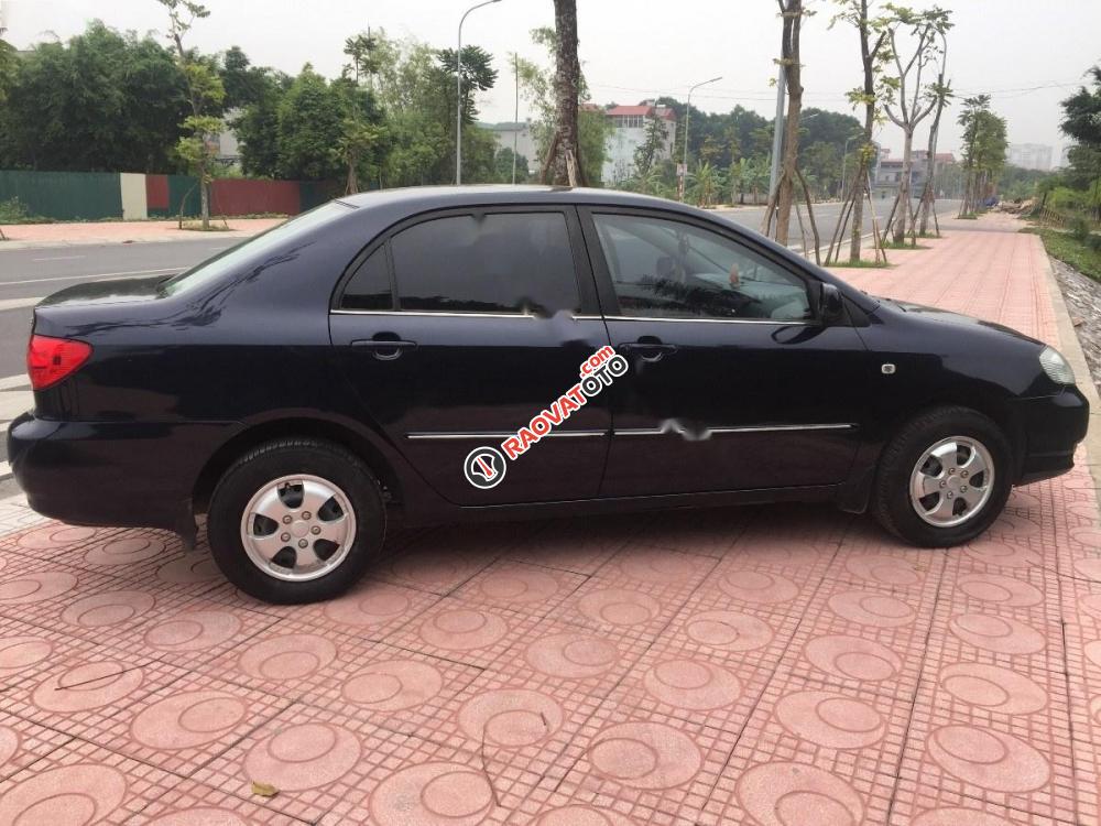 Bán Toyota Corolla altis 1.8G MT đời 2002, màu đen xe gia đình, giá tốt-4