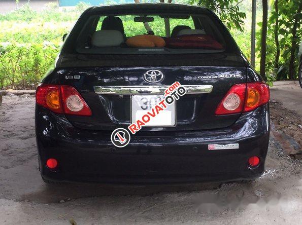 Cần bán xe Toyota Corolla altis đời 2010, màu đen số sàn, 500tr-4