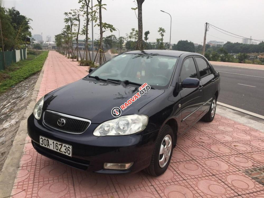 Bán Toyota Corolla altis 1.8G MT đời 2002, màu đen xe gia đình, giá tốt-0