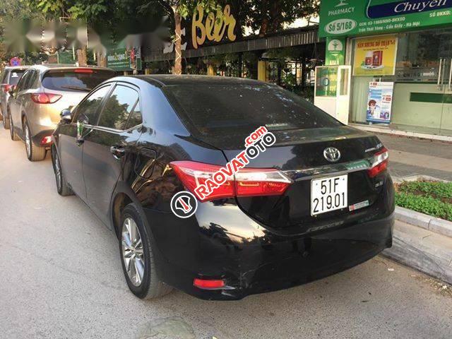 Bán Toyota Corolla altis 1.8G năm 2015, màu đen, giá tốt-0