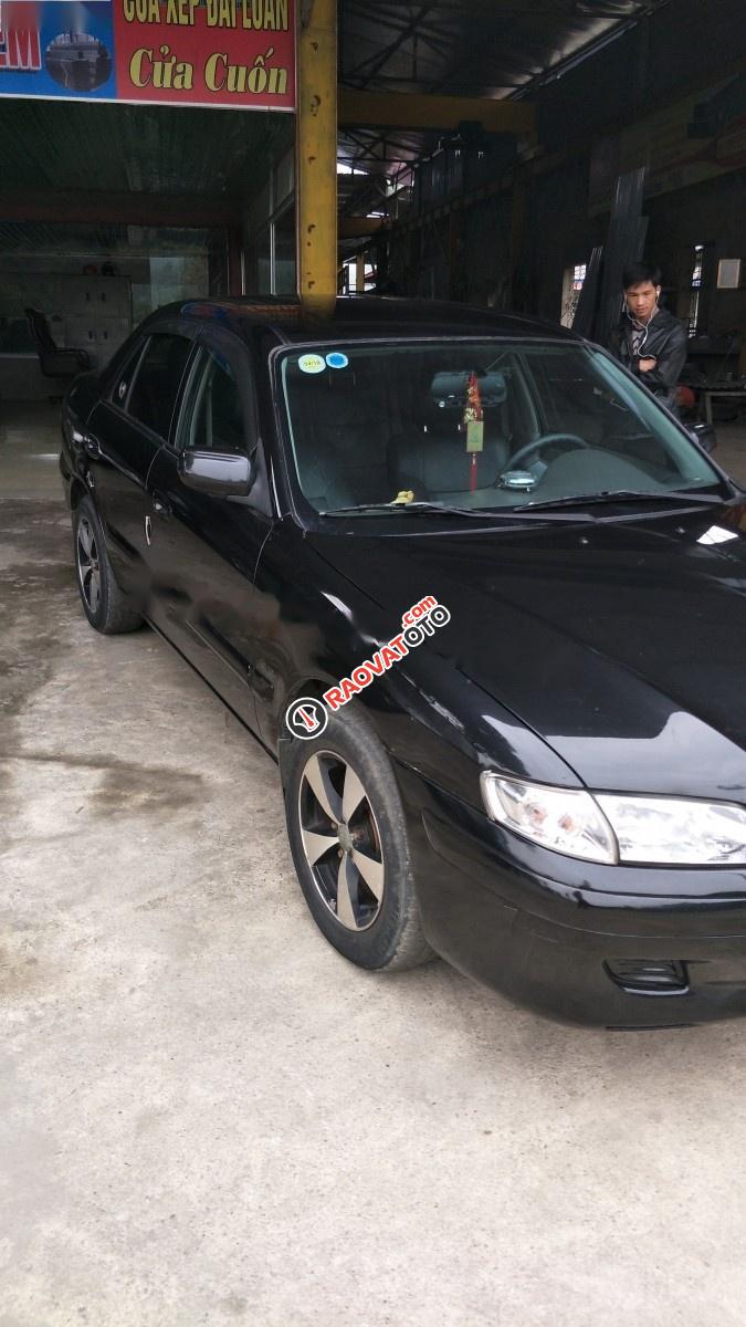 Bán Mazda 626 đời 2002, màu đen, nhập khẩu nguyên chiếc, 166 triệu-1