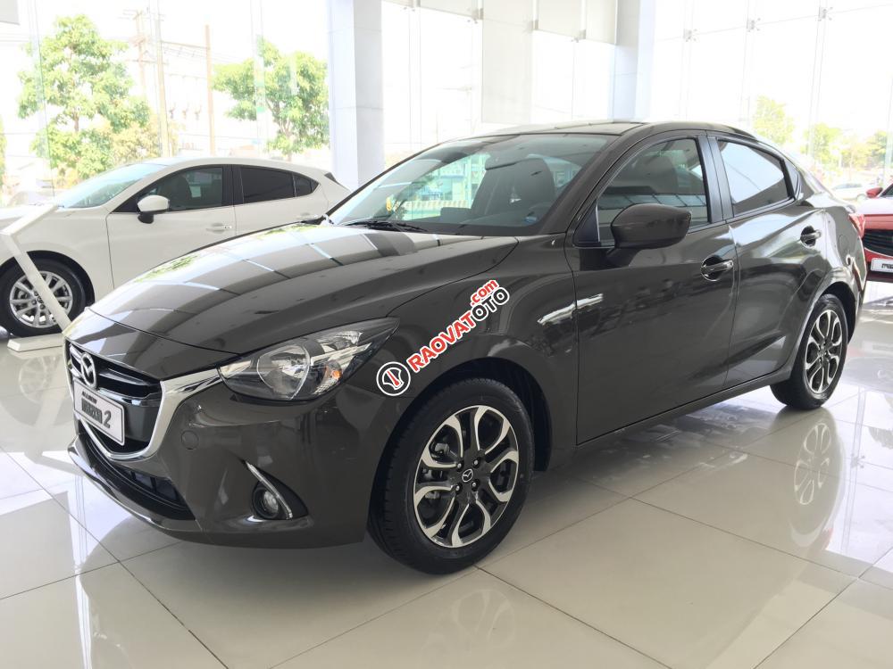 Bán xe Mazda 2 1.5L màu nâu, xe mới 100%, hỗ trợ vay đến 80% giá trị xe, liên hệ Mr. Thông- 0937299026-4