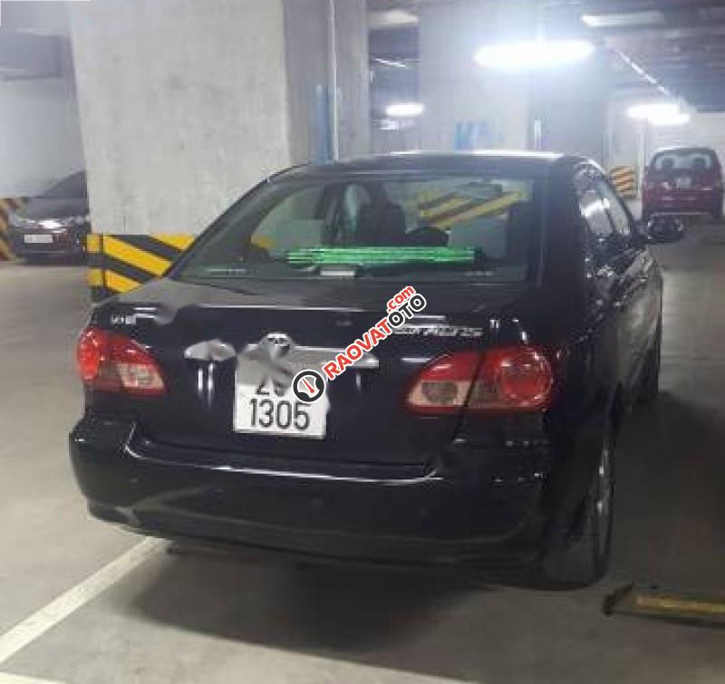 Cần bán gấp Toyota Corolla Altis 1.8G MT năm 2004, màu đen chính chủ-1