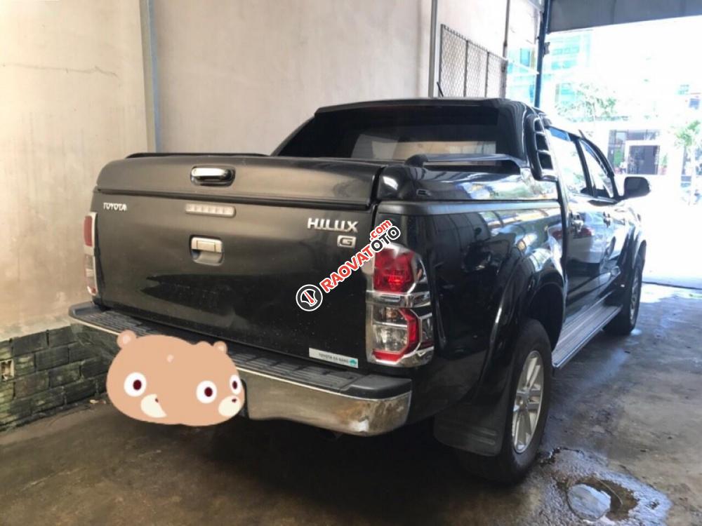 Bán Toyota Hilux năm 2014, màu đen, nhập khẩu, giá 555tr-0