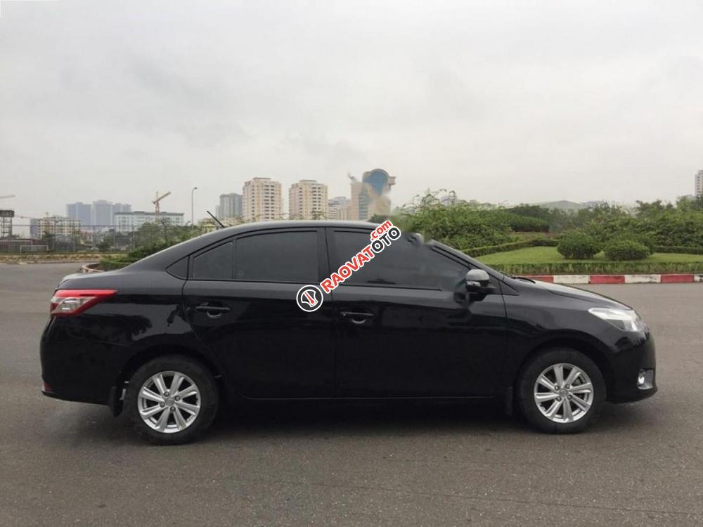 Bán Toyota Vios 1.5E đời 2014, màu đen chính chủ, giá 410tr-6