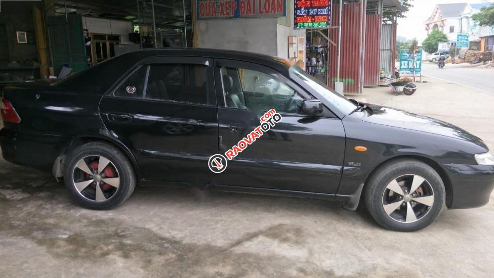 Bán Mazda 626 đời 2002, màu đen, nhập khẩu nguyên chiếc, 166 triệu-5