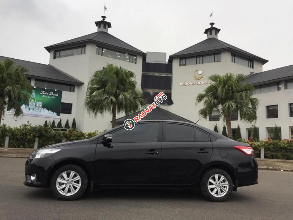 Bán Toyota Vios 1.5E đời 2014, màu đen chính chủ, giá 410tr-1