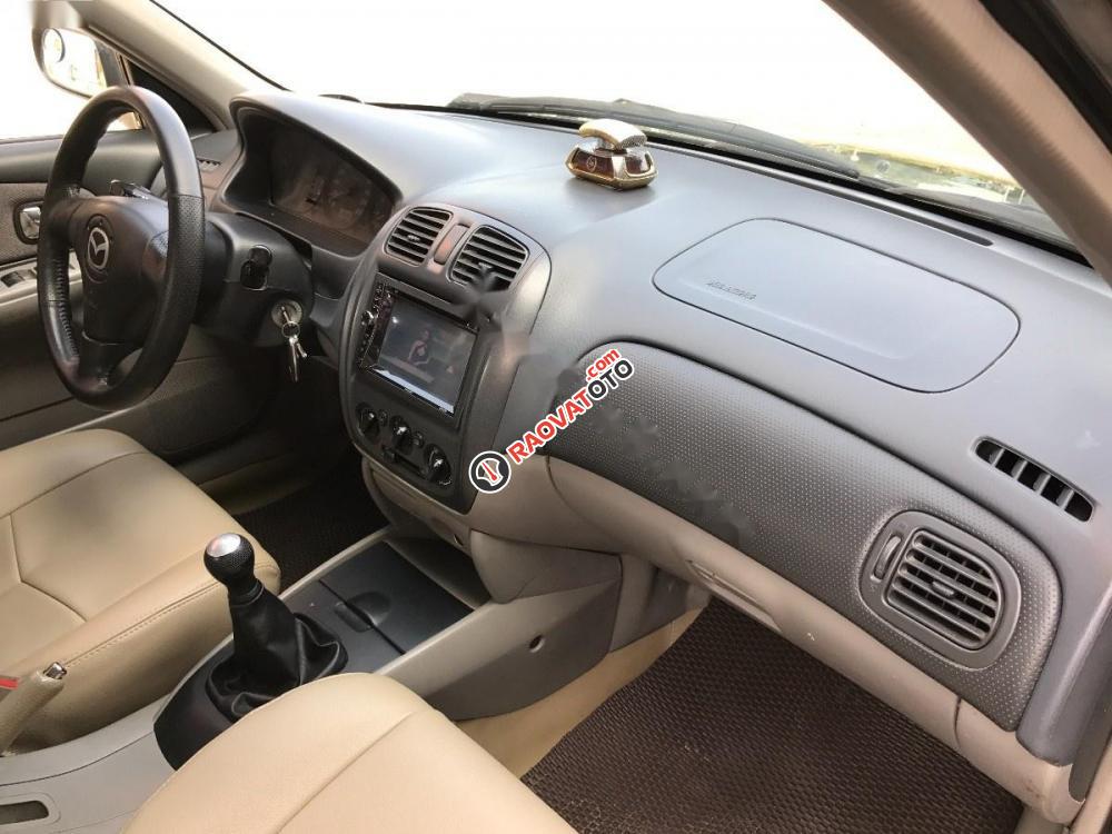 Bán Mazda 323 đời 2004, màu đen, xe nhập, giá tốt-1