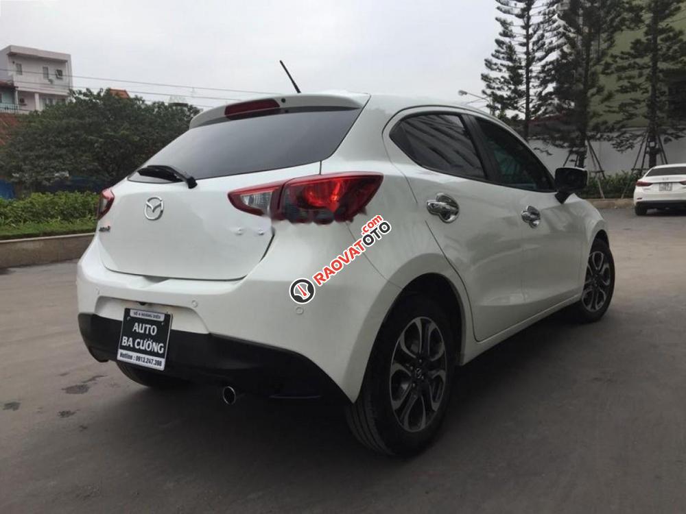 Cần bán lại xe Mazda 2 1.5 AT đời 2016, màu trắng số tự động, giá 535tr-7