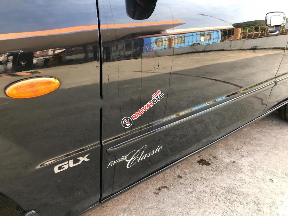 Bán Mazda 323 đời 2004, màu đen, xe nhập, giá tốt-0