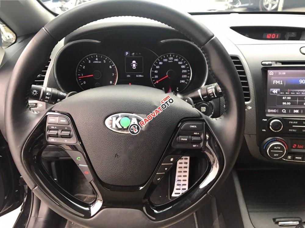 Bán xe Kia Cerato 1.6 AT đời 2016, màu đen còn mới-1