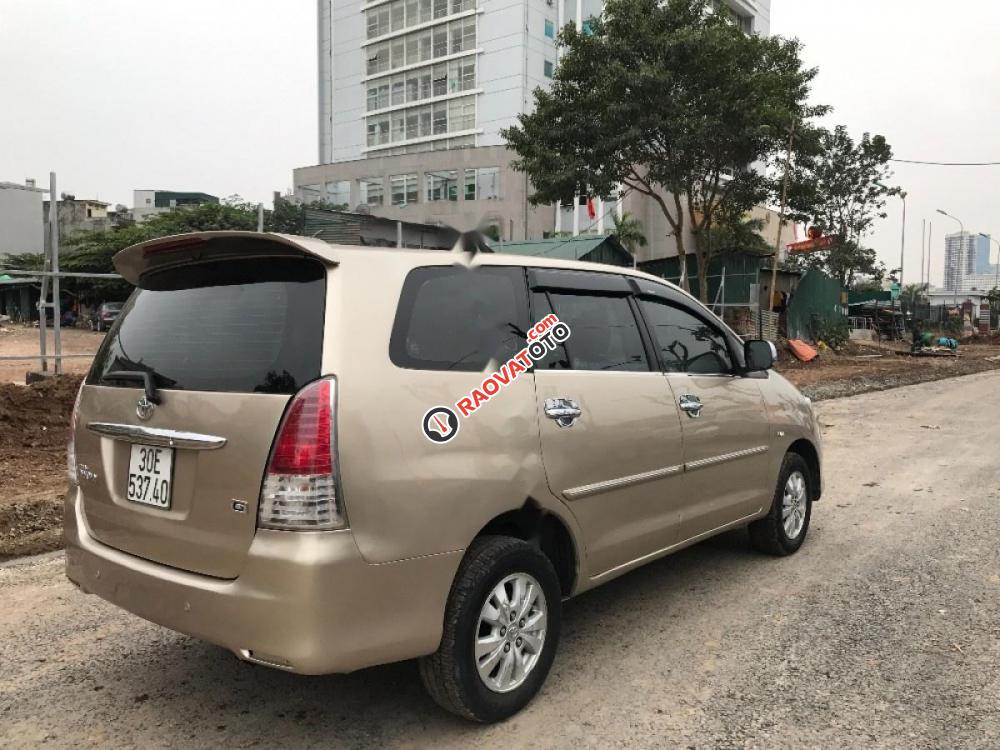 Cần bán Toyota Innova 2.0G đời 2010, màu vàng chính chủ-5