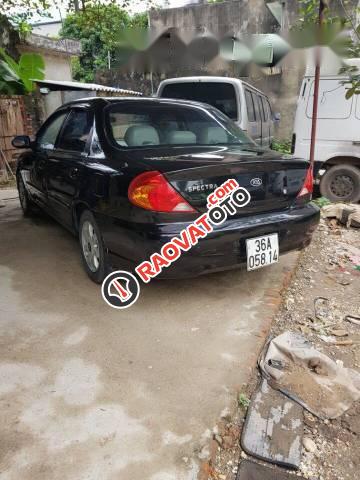 Cần bán Kia Spectra 2004, màu đen-1