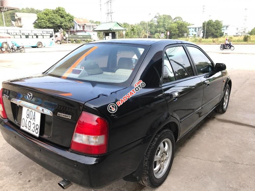 Bán Mazda 323 đời 2004, màu đen, xe nhập, giá tốt-5