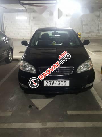 Chính chủ bán Toyota Corolla Altis đời 2004, màu đen-0