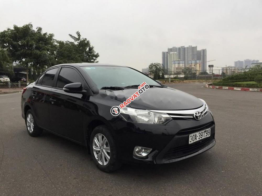 Bán Toyota Vios 1.5E đời 2014, màu đen chính chủ, giá 410tr-0