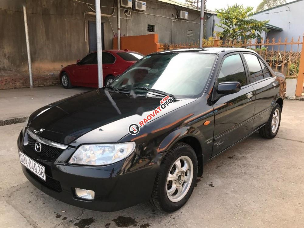 Bán Mazda 323 đời 2004, màu đen, xe nhập, giá tốt-7