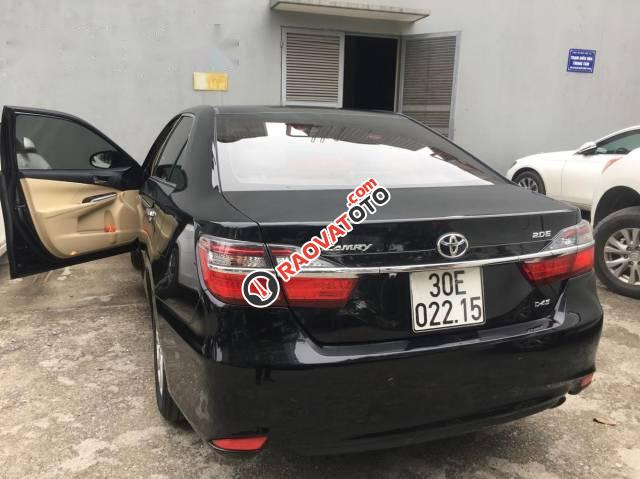 Bán Toyota Camry sản xuất 2016, màu đen chính chủ, giá 910tr-1