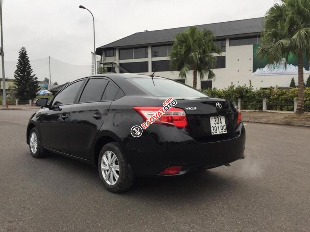 Bán Toyota Vios 1.5E đời 2014, màu đen chính chủ, giá 410tr-4