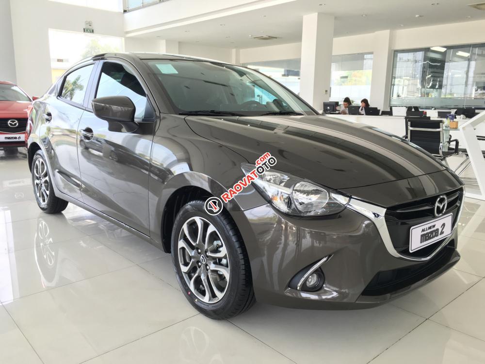 Bán xe Mazda 2 1.5L màu nâu, xe mới 100%, hỗ trợ vay đến 80% giá trị xe, liên hệ Mr. Thông- 0937299026-0