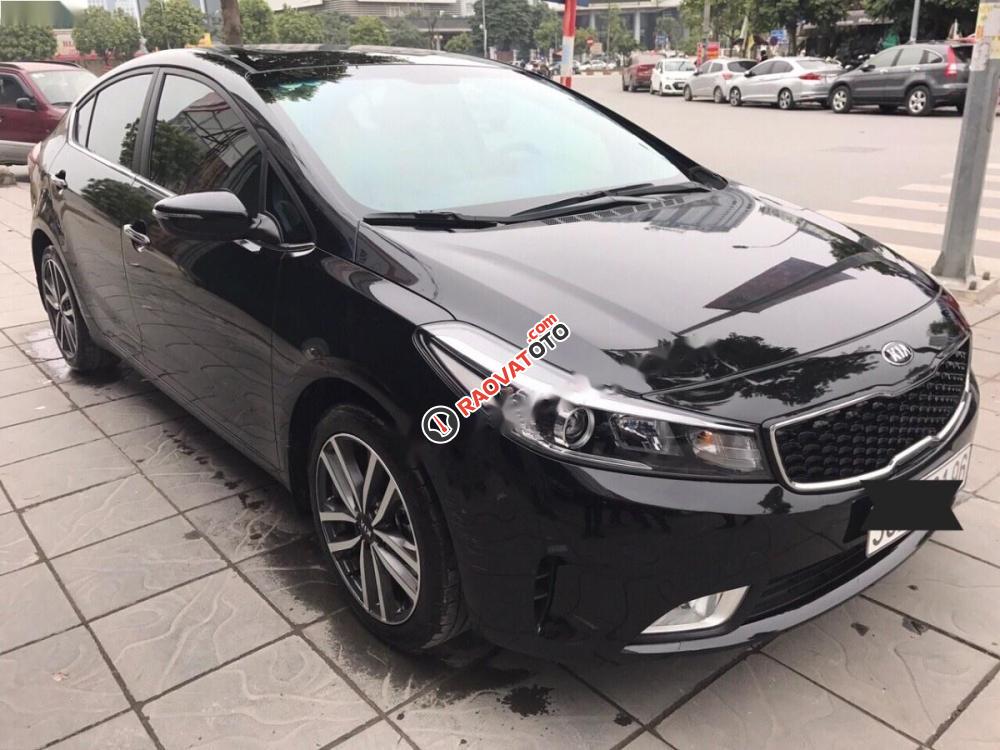 Bán xe Kia Cerato 1.6 AT đời 2016, màu đen còn mới-9
