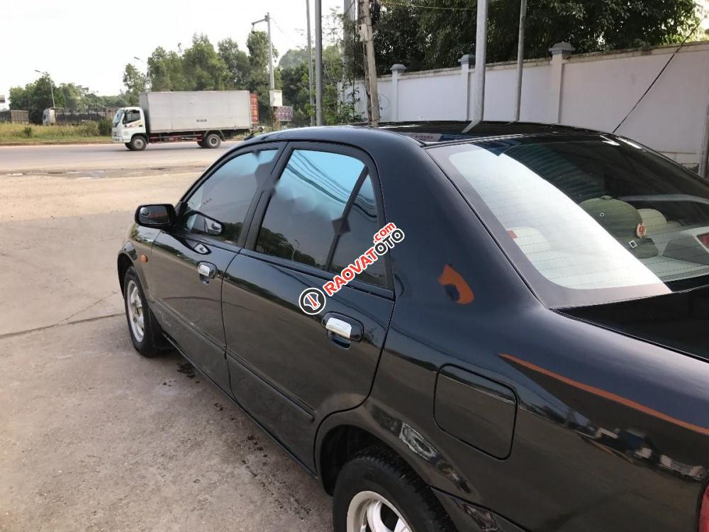 Bán Mazda 323 đời 2004, màu đen, xe nhập, giá tốt-6
