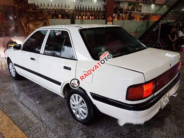 Cần bán lại xe Mazda 323 đời 1997, màu trắng, nhập khẩu nguyên chiếc chính chủ, 85 triệu-0