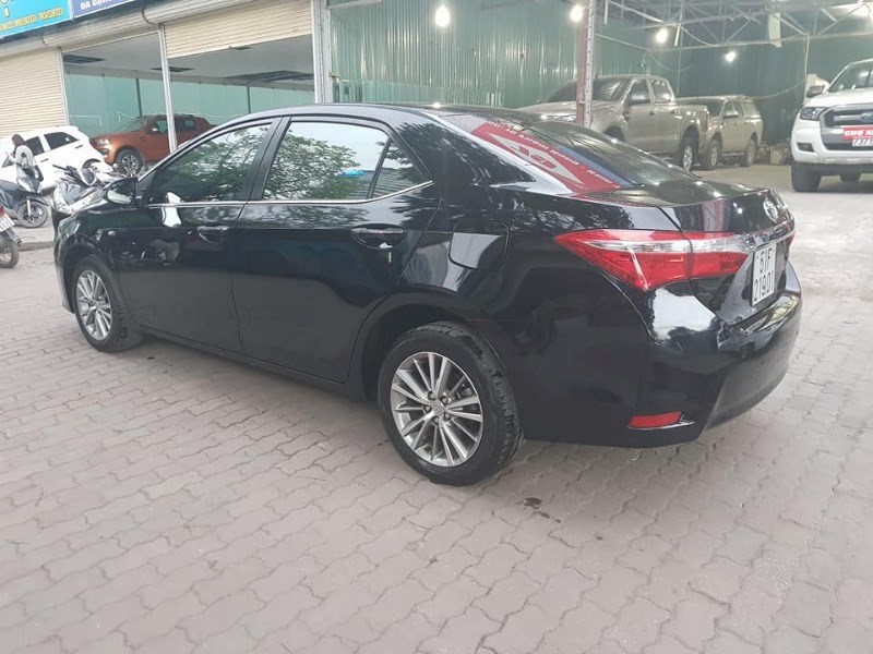 Cần bán lại xe Toyota Corolla altis 1.8 đời 2015, màu đen, xe nhập-4