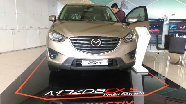 Bán ô tô Mazda CX 5 đời 2017, màu vàng, xe nhập-0