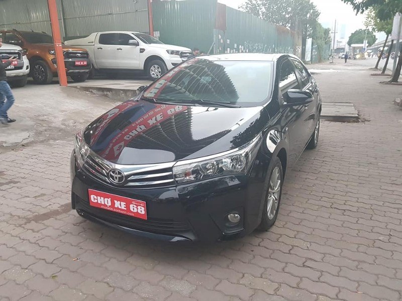 Cần bán lại xe Toyota Corolla altis 1.8 đời 2015, màu đen, xe nhập-1