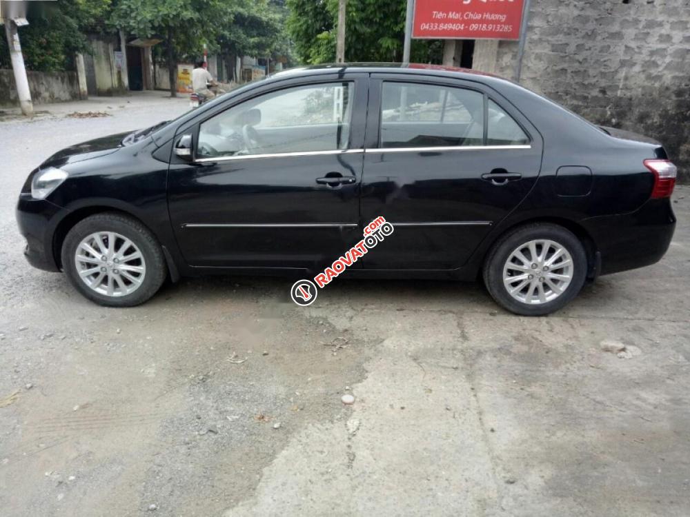 Bán ô tô Toyota Vios 1.5E đời 2013, màu đen chính chủ, giá tốt-1