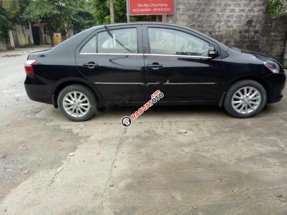 Bán ô tô Toyota Vios 1.5E đời 2013, màu đen chính chủ, giá tốt-3