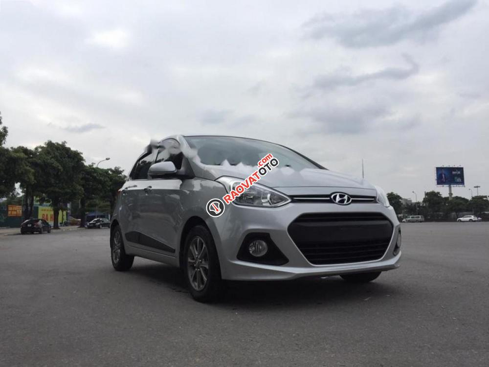 Bán Hyundai Grand i10 1.2 AT đời 2015, màu bạc, nhập khẩu  -0