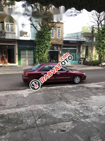 Cần bán xe Kia Spectra sản xuất 2003, màu đỏ chính chủ-2