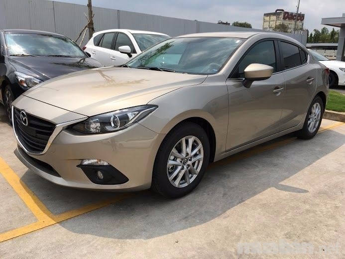 Bán xe Mazda 3 1.5L AT đời 2017, màu vàng, xe nhập -0