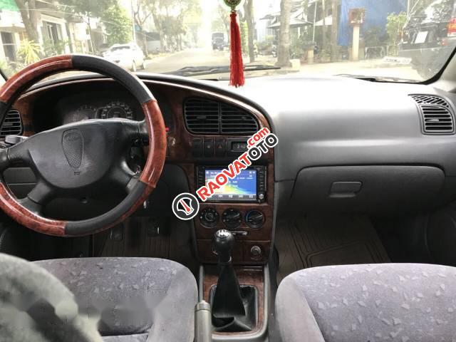 Cần bán xe Kia Spectra sản xuất 2003, màu đỏ chính chủ-1